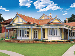 Federation Australian Bold Yellow Weatherboard Exterior with Blue Decorative Posts and Gable